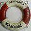 White and red life buoy with S.S. Koranui written in black capital letters