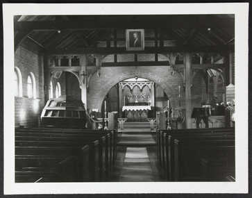 Interior photograph of the St Peter chapel taken from the back of the chapel and showing the news, the pulpit, the altar