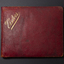 Rectangular shaped book covered in burgundy leather with golden letters on the left top corner: Visitors