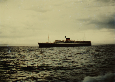 A colour photograph of the ocean and a ship - the Cape Town Castle - off the coast of Cape Colony, dated 29-2-48.
