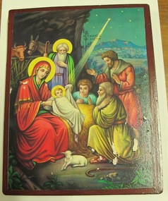 Icon style depiction of a Nativity in bright colours.