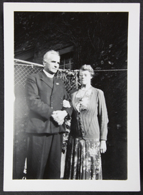 Padre Frank Oliver and Mrs Oliver in the garden at the Mission