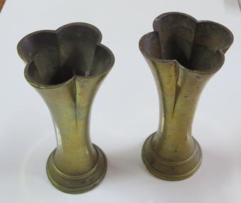 Pair of small clover shape brass vases