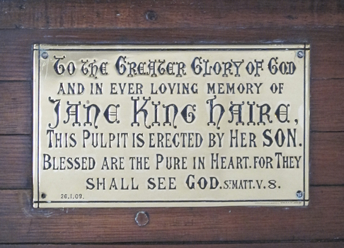 Bronze plaque on pulpit in memory of Jane King Haire