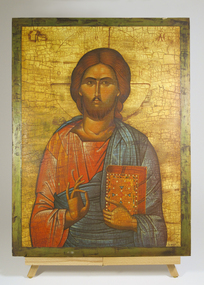 Orthodox icon styla painting of Jesus with thumb and ring finger touching symbolising Incarnation