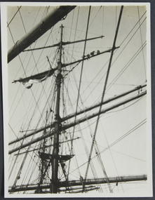 Photograph, On board the William Mitchell: Bending sail, 1925-26