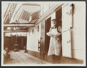 Cook holding a tureen on board the ship Crocodile