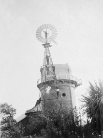 Photograph, Seamen climbing a windmill for water pumping