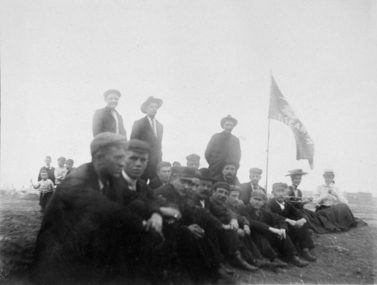 Photograph, Group of seamen with Flying Angel flag