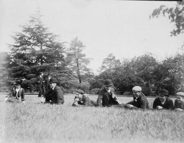 Photograph, Seamen laying on the grass