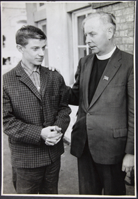 photograph - Photograph, Black and white, Herald Sun, Reverend comforting a young seaman, c. 1960