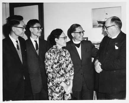 Reverend Wong and his family meeting with other Reverend.