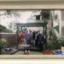 Group of volunteers under the pergola in the garden of the Mission to Seafarers, Melbourne.