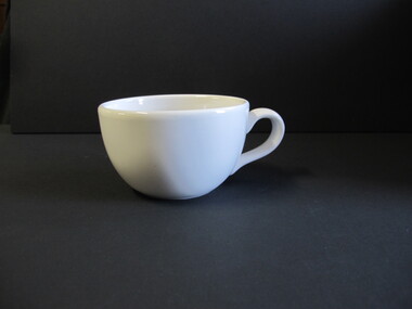 White china tea cup with handle