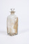 Clear glass  squared-base medicine container  with glass lid.