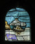 Stained glass window depicting te