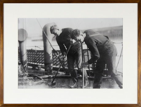 Black and white photographs depicting two seamen sweeping the deck of a ship with brooms