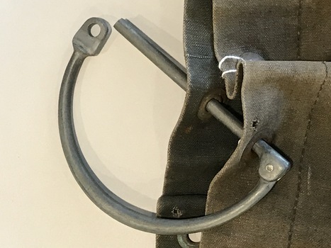 Close-up view of curved D-clasp