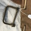 Close-up view of metal D-clasp