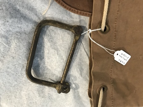 Close-up view of metal D-clasp