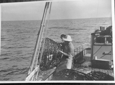 Photograph, Fishermen working with lobster pots, 1950s