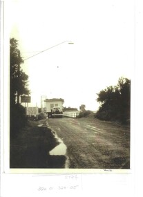 Photograph, House moving to Phillips Island crossing Phillip Island bridge on Newhaven side see 324-01 324-04