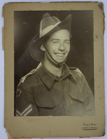 Photograph - Studio portrait of  Corporal 'Curly' Papworh, Artgraph Studio, March 1943