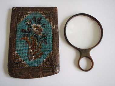 Magnifier lens in bead case, unknown, mid 19th century