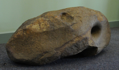 Aboriginal grinding stone, Aboriginal people have shaped this rock through usage, pre-European Australia