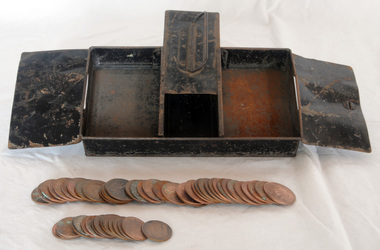 metal money box with coins, 1920's