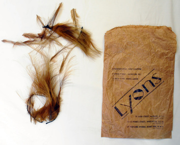 paper bag of feathers, C. 1940's