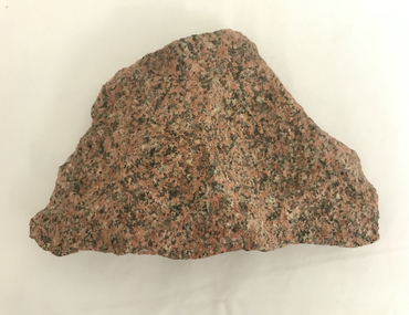 Geological specimen - piece of pink granite rock from Gabo Island, East Gippsland Victoria