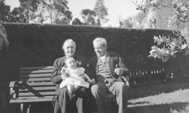 Photograph, Mr. and Mrs. Springett on a garden seat - Ringwood, c1930, C. 1930