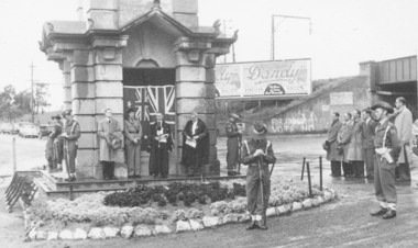 Photograph, Anzac Day Ceremony at Ringwood Clocktower in original position, cnr. Maroondah Highway and Warrandyte Road, Ringwood - circa 1950