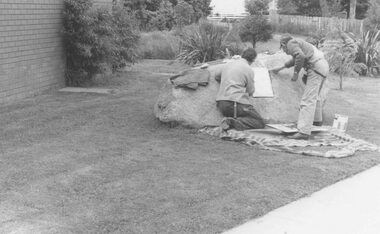 Photograph, Fixing of tablet to Pioneers Stone in Ringwood library grounds