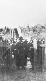 Photograph, Mrs. H. Pump cutting ribbon at opening of Heathmont Railway Station, 1926