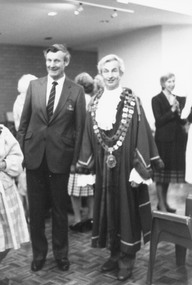 Photograph, City of Ringwood Chief Executive, Mr. Alan Robertson (left), and Mayor Cr. Bill Wilkins attending the opening of "Lionsbrae" aged care facility, Everard Road Ringwood East - 17/11/1985