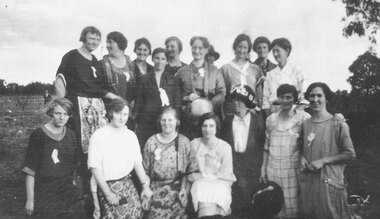 Photograph, Organising committee helpers at the opening of East Ringwood Railway Station, 27 June,1925.  List of those named shows back row from left to right - Bertha Hodges, Mrs. Lord, ?, Mrs. Hann, Mrs. Watson, ?, Mrs. Maggs, ?. 2nd row - Linda Pump, Vera Watson, Alma Dickson, Marj Blood, ?, Mrs. Howship, Poss Howship