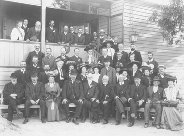 Photograph, Opening day of Ringwood Mechanics Institute, Maroondah Highway - 1909.  Attendees include: Veranda: Roy Thomas, Howard Falconer, W. Foreshaw, --, Harry Falconer, --, Rev. H. Greenwood, Mr. Tucker, Mr. R.W.M. Chalmers, Mr. Jack Pollard. Standing Steps: --, Rev. Schules, Mr. A.V. Greenwood.  3rd Row (standing from left): Mr. A. Loughnan, Cr. A.B. Taylor, Mr. W. Unsworth, Mr. Hockin, Mrs. Theo Anderson, Mr. J.B. McAlpin, Rev. J. Nicholson, Mr. Alf Hocking.  2nd Row (Standing from left): Cr. Tulley, Cr. A.B. Taylor, --, Mrs. E.E. Walker, Mrs. R.V. Greenwood, --, Miss Edgar, --, Capt. Ecklestein.  Front Row (Sitting from left): Mr. Gwillam, Architect, Hon. D.E. McBryde, MLC, Mrs. J. Murray, Hon. S. Murray, Premier, Mr. J. Parker, President, Rev. D. Porteous, Hon. W.H. Edgar, MLC, Hon. W.J. Evans, MLC, Mr. T. Brown