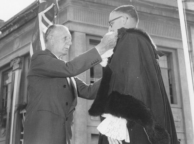 Photograph, Proclamation of the City of Ringwood, 19 March, 1960.Ringwood Mayor, Cr. A. Lavis receiving mayoral chain from Governor of Victoria, Sir Dallas Brooks
