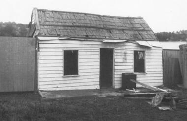 Photograph, Dismantling of original Miners' Cottage in Maroondah Highway, Ringwood, prior to re-construction at Ringwood Lake c.1970s