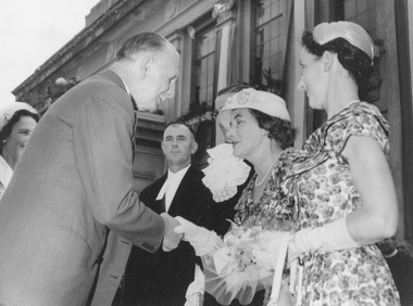 Photograph, Proclamation of the City of Ringwood, 19 March, 1960 - Sir Dallas Brooks shaking hands with Mayoress Mrs. Lavis. Town Clerk Fred Dwerryhouse, Mrs. Dwerryhouse.  Lady Brooks behind Sir Dallas