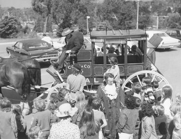 Photograph, "Back To" celebrations at Ringwood Civic Centre - 19.10.1974.  Mayor Cr. Stan Morris arriving by Cobb & Co coach