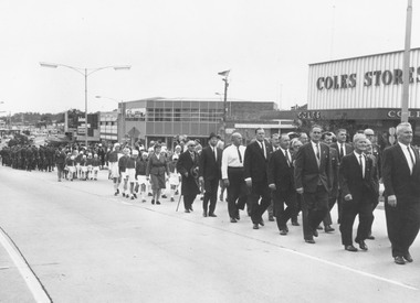 Photograph, Ringwood Clocktower re-opening ceremony march, cnr Maroondah Highway and Wantirna Road, Ringwood, (re-located from previous site at Warrandyte Road), 9/12/1967