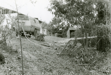 Photographs, 1979-80 MMBW pipe line project at Hubbard Reserve, North Ringwood � Compressor unit in backyard