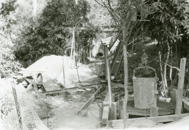 Photographs, 1979-80 MMBW pipe line project at Hubbard Reserve, North Ringwood � View east, sewer work line showing grate over pit