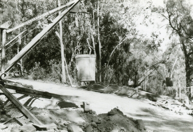 Photographs, 1979-80 MMBW pipe line project at Hubbard Reserve, North Ringwood � Swivel crane over first hole west of boring pit in 39 Burlock Avenue