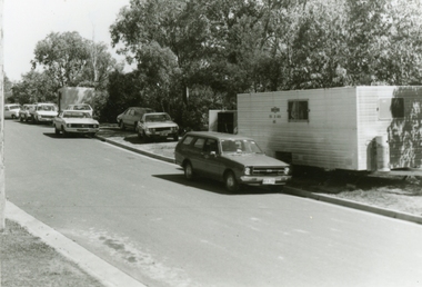 Photographs, 1979-80 MMBW pipe line project at Hubbard Reserve, North Ringwood � cars and caravan of gang