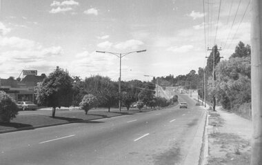 Photograph, Eastward view along Maroondah Highway towards Mount Dandenong Road, Ringwood.  Ringwood Lake Park on right. 1973. Second image labelled May 1971