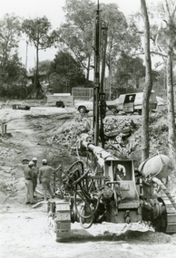 Photographs, 1979-80 MMBW pipe line project at Hubbard Reserve, North Ringwood � Air track drill rig